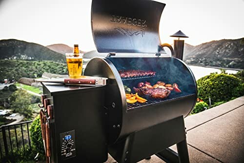 BBQ grill with food and drink in scenic outdoor setting