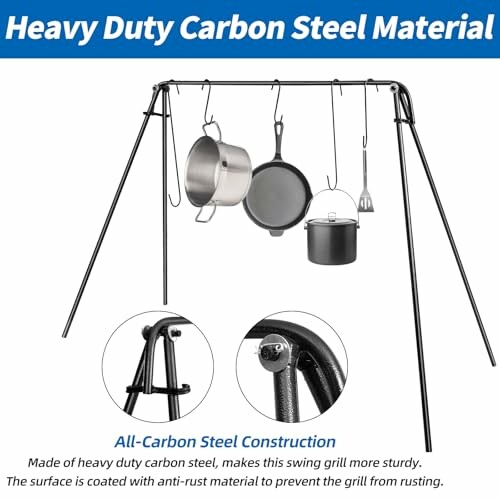 Heavy duty carbon steel cooking tripod with hanging pots and utensils.