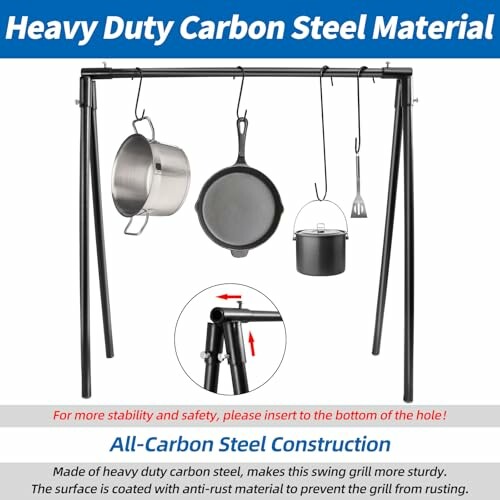 Heavy duty carbon steel cooking stand with hanging pots and utensils.