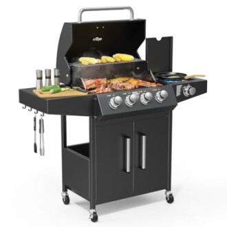 Outdoor gas grill with food and cooking utensils.