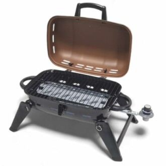 Portable gas grill with open lid and burner control knob.