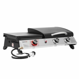 Portable gas grill with two burners and lid