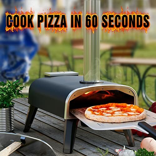 Portable pizza oven with a pizza on a peel, outdoor setting.