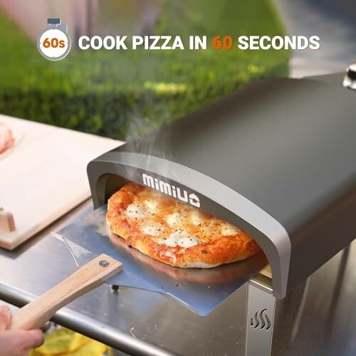 Portable pizza oven cooking a pizza in 60 seconds.