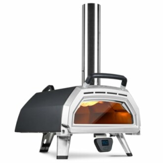 Compact portable pizza oven with chimney and temperature display.