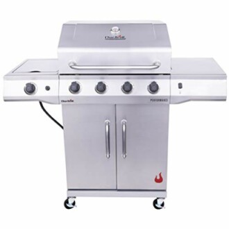 Stainless steel gas grill with four burners and side shelves.