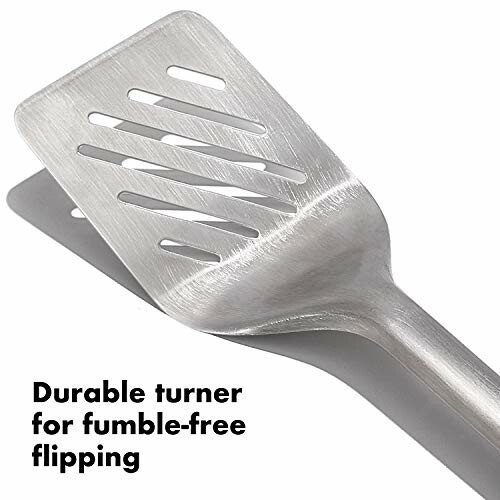 Durable stainless steel slotted turner for cooking.